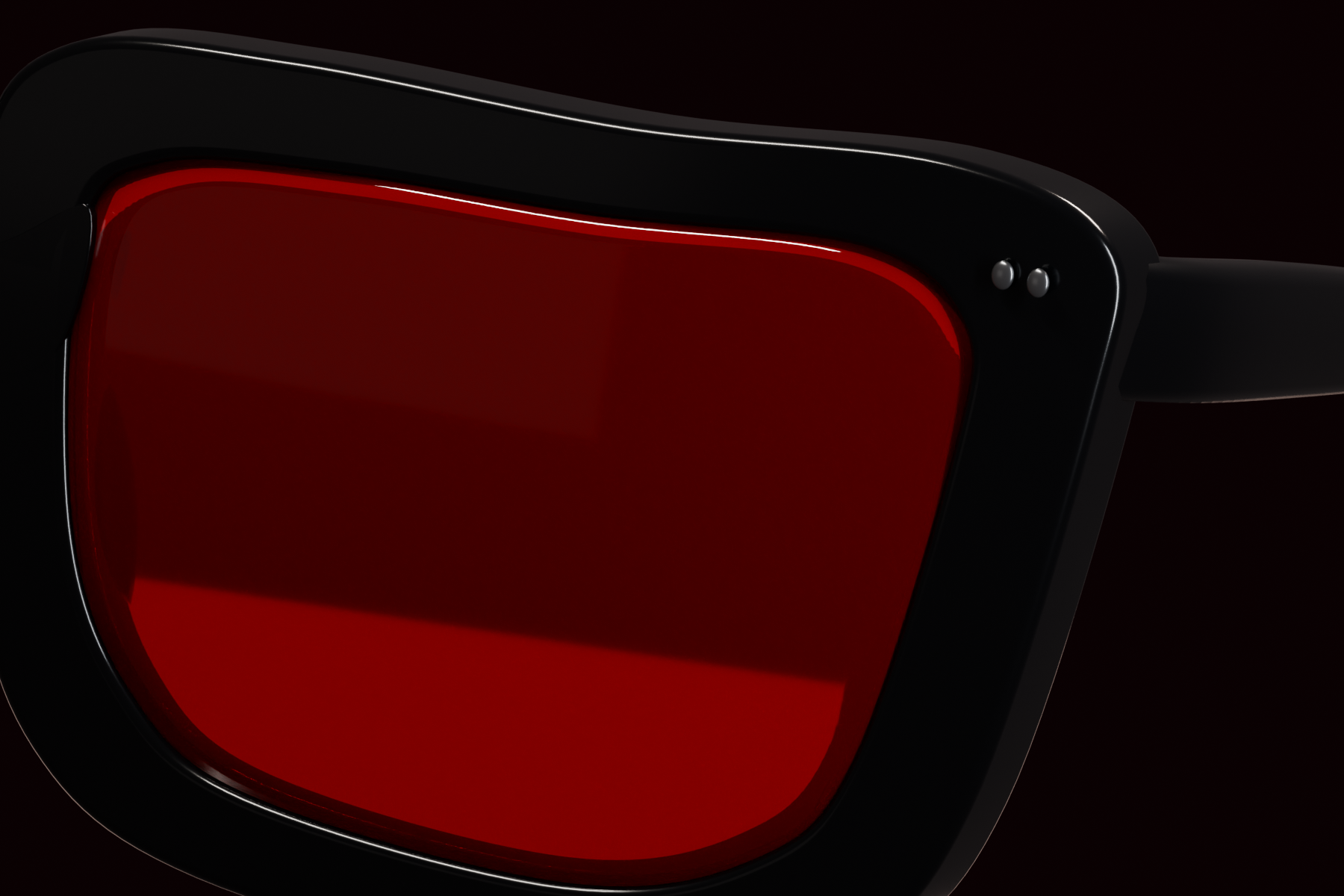 Close view of the curved ruby lens and black frame